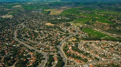 Aerial photographic view of contemporary Thousand Oaks showing suburban neighborhoods nestled among rolling hills and preserved open spaces